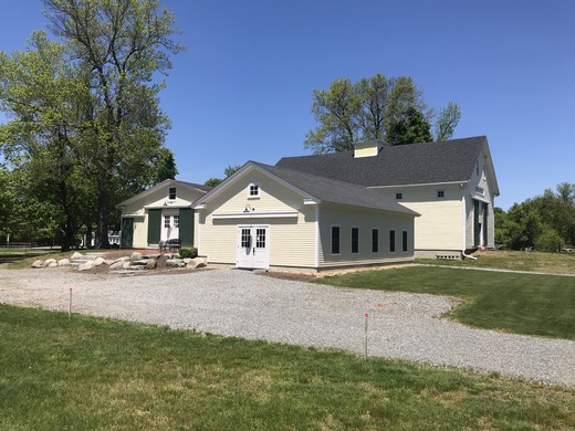 Wide view of Todd Farm grounds with vendor tables