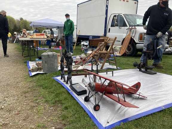 Flea market vendors and treasures